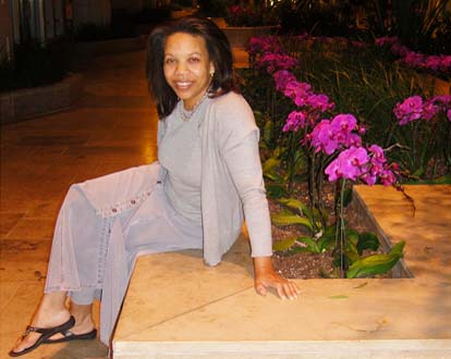 Paula in gray seated